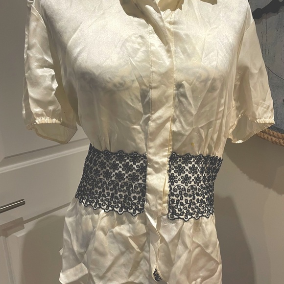 Beautiful silk blouse with black lace trim along the waist area. - Picture 3 of 10